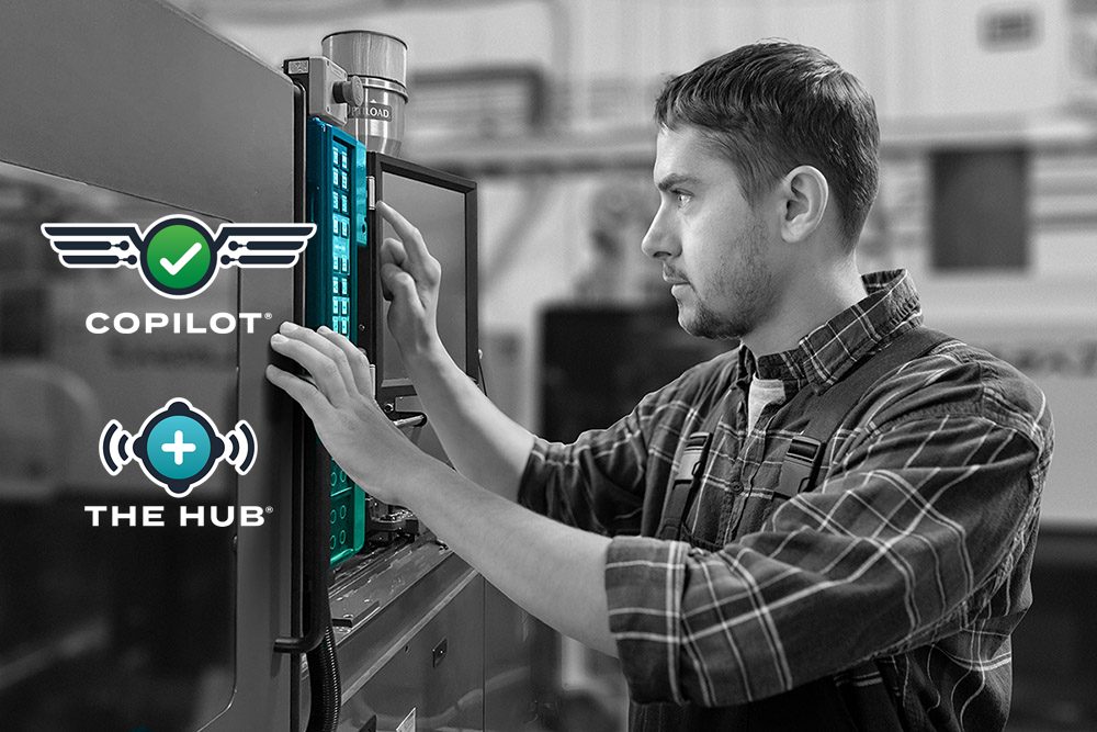 Student operating machine using CoPilot system in lab